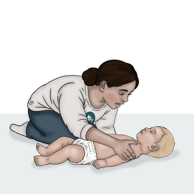 A woman leans over a baby lying on their back and places her hand on the baby’s shoulder gently squeezing it to check for a response..