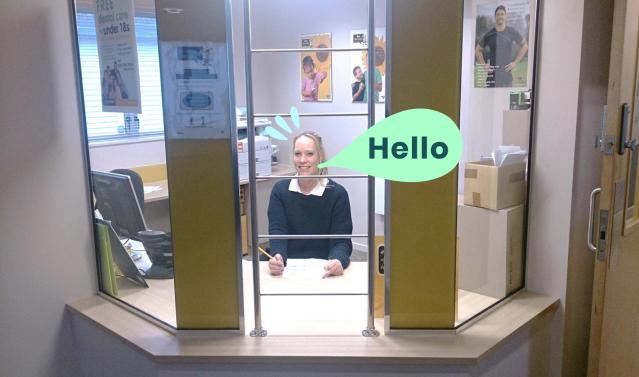 Photo of a person sitting at the dental clinic reception