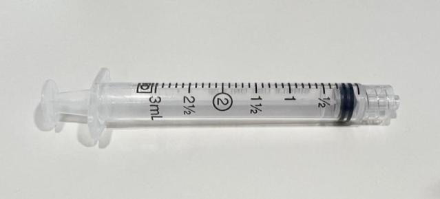 Syringe for giving buccal midazolam with