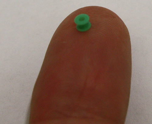 A grommet on an adult finger