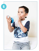 Child pressing  the inhaler once