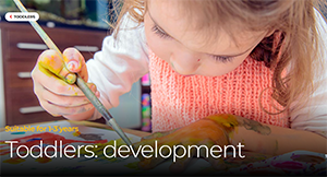Screenshot of toddlers' development page of Raising Children Australia website - photo of a toddler painting 