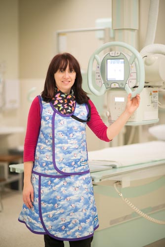 photo of a radiographer with an xray machine 