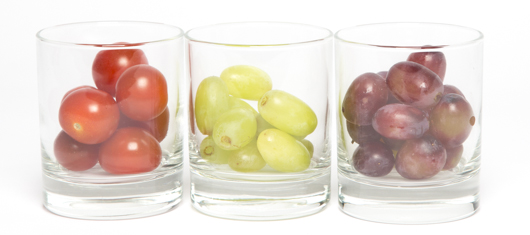 Small round tomatoes, green grapes, red grapes