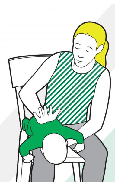 Image showing a woman giving back slaps to a choking baby